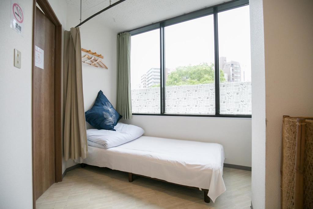 123 Guesthouse أوساكا الغرفة الصورة